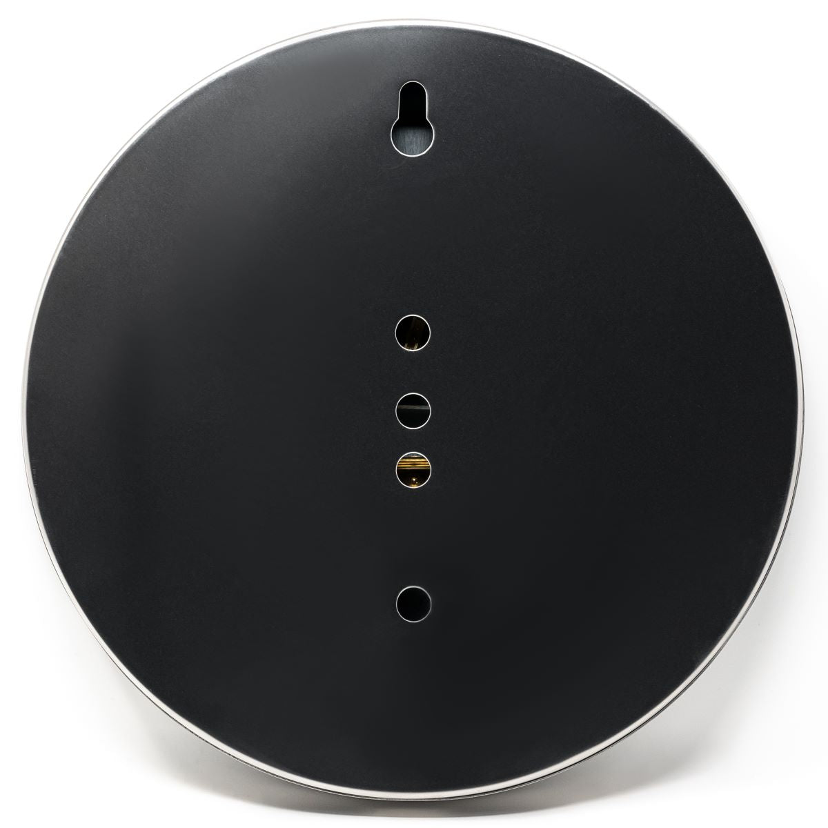 Back view of a round wall barometer or clock with mounting hole and black finish