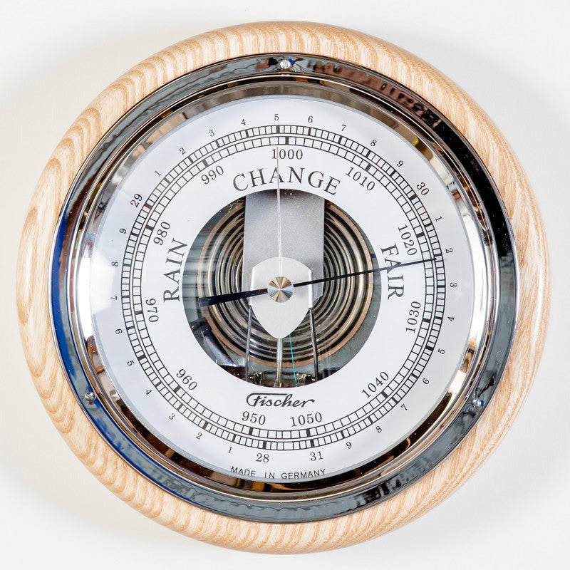 German made analog wall barometer with wooden frame and weather dial