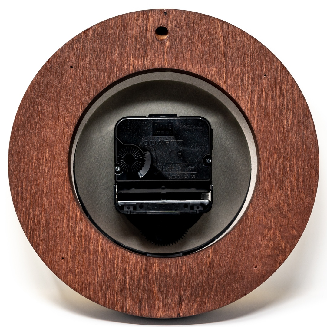 Back view of round wooden wall clock with quartz movement mechanism