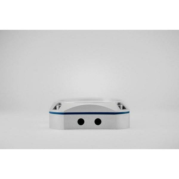 Side view of a modern rectangular barometer or weather station device with two sensor holes