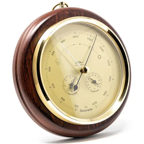 Classic round analog barometer with thermometer and hygrometer in wood and brass finish