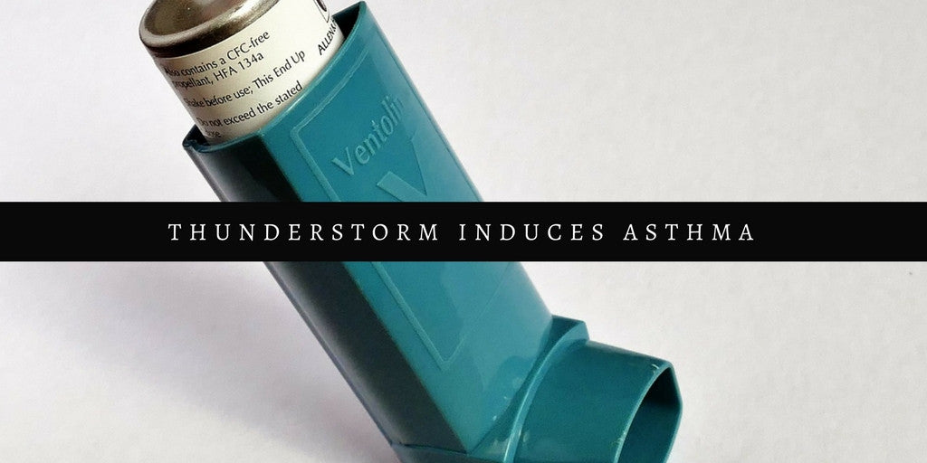 Blue asthma inhaler with thunderstorm asthma warning text on white background