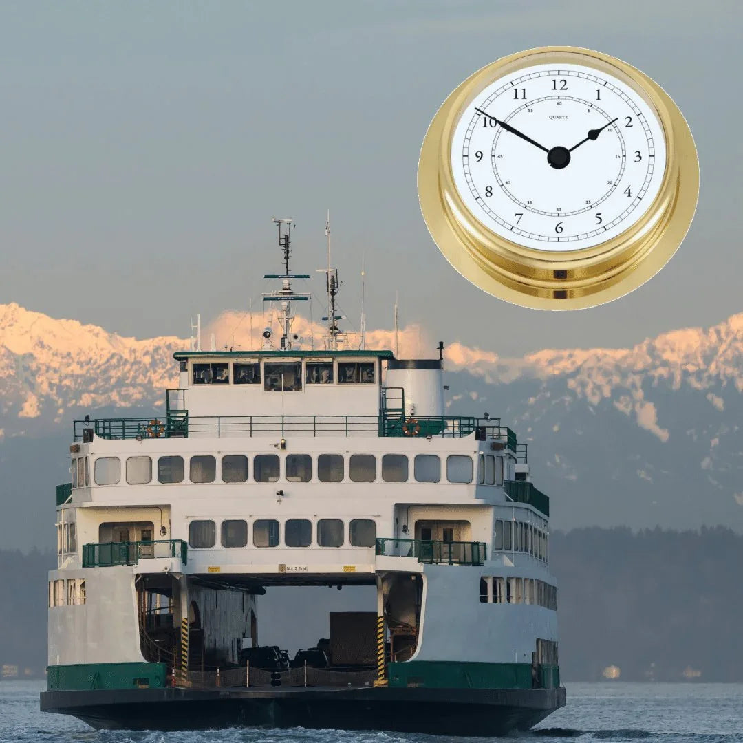 Nautical brass ship's clock with ferry boat and mountains in the background
