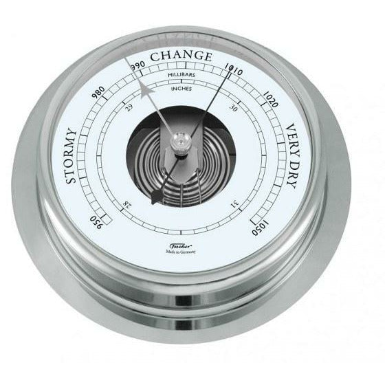 Round analog barometer with chrome frame and weather indicators for stormy, change, very dry