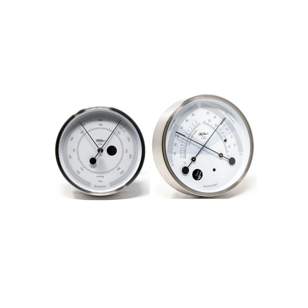 Two German-made analog weather instruments, barometer and thermometer, on white background.