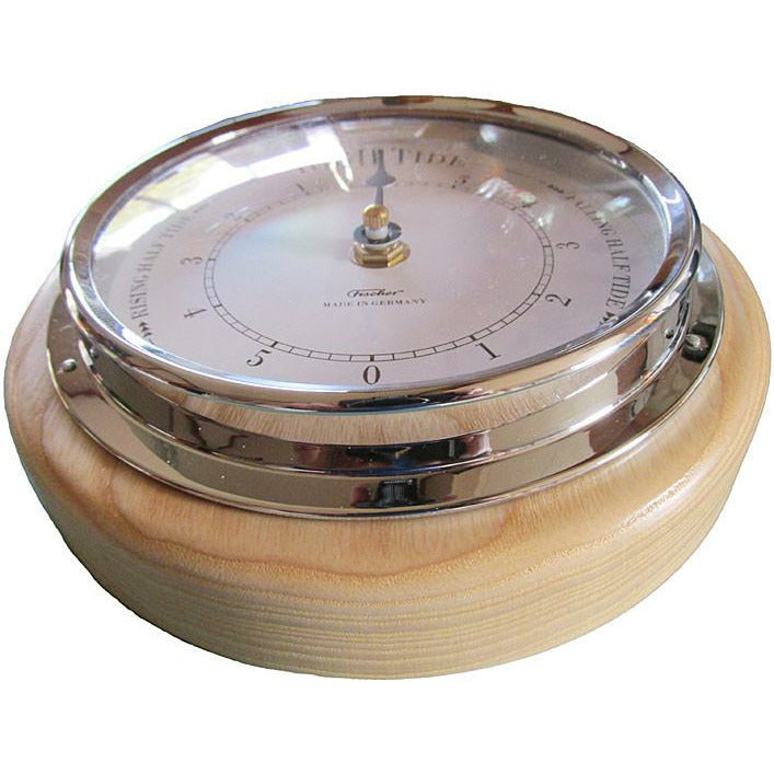 German made nautical tide clock with chrome bezel and wood trim, showing high tide.